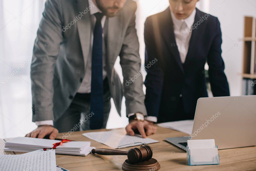 Attorney reviewing SNAP investigation documents with a retailer