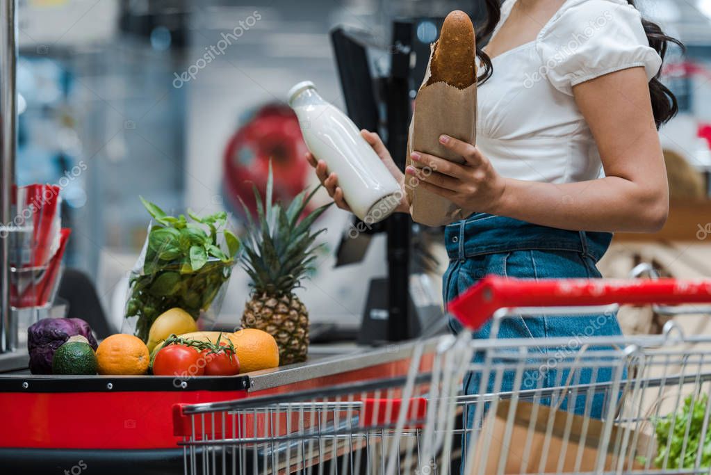 Retail grocery store counter serving customers